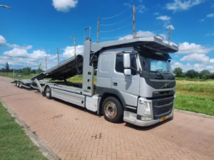 Volvo FM 370 Autotransport + Groenewold 7-lader + aanhanger